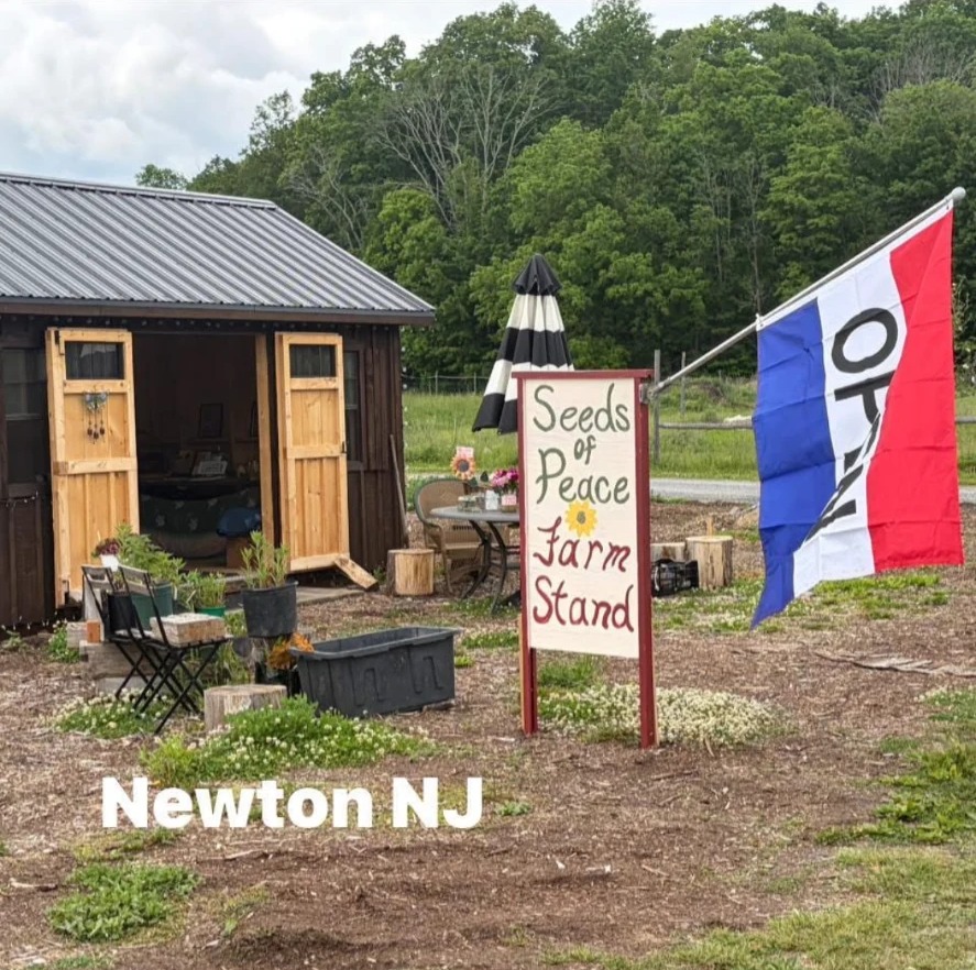 The Seeds of Peace farm stand shed and sign in Newton, New Jersey